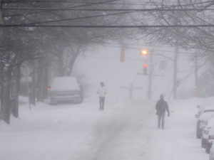 Dangerous heavy snow and winds approaching hurricane intensity could knock out power and flood coastal areas