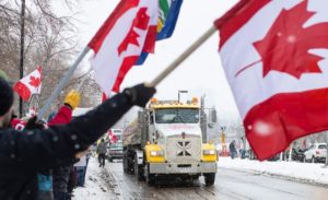 Canadian truckers shut down busiest border crossing in North America, back up Detroit roads